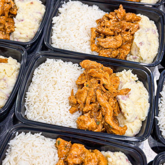 AVAILABLE NOW, FROZEN- Chicken strips with onions and soy sauce, rustic mashed potatoes, white rice, and pinto beans on the side.
