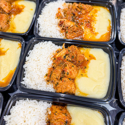 AVAILABLE NOW, FROZEN- Chicken breast in sauce, white rice, polenta, and beans on the side.