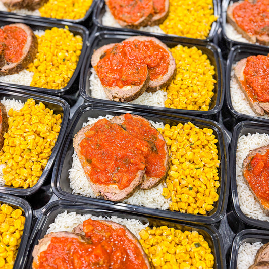 AVAILABLE NOW, FROZEN- Beef roll stuffed with ham and cheese, finished w/ tomatoes and fresh basil, served with white rice and sautéed corn.