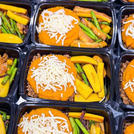 AVAILABLE NOW, FROZEN- Butternut squash shepherd’s pie with lean ground beef and low-fat mozzarella, served with grilled asparagus sautéed with red onions and zucchini.