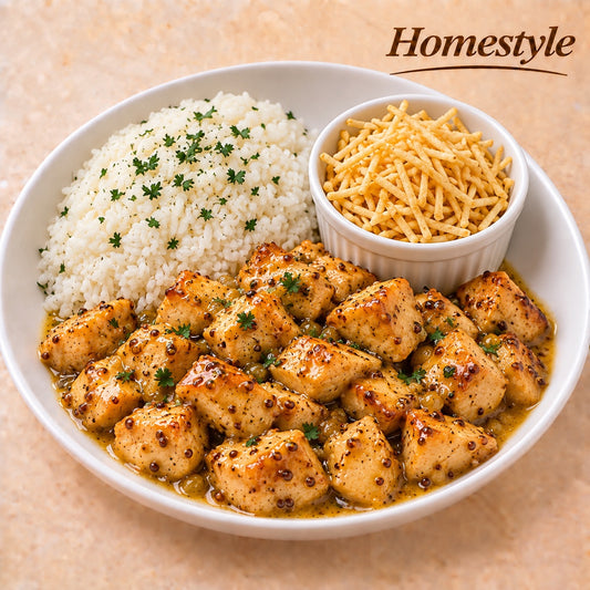 HOMESTYLE 300G- Chicken cubes in honey mustard sauce, rice and shoestring potatoes on the side.