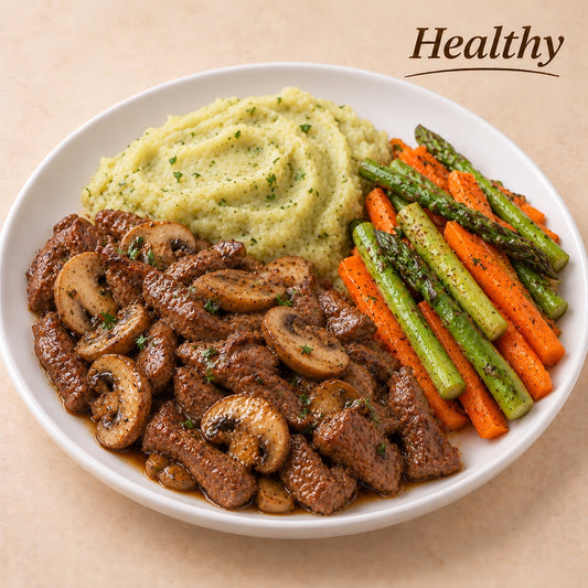 AVAILABLE NOW, FROZEN- Beef strips with mushrooms, Brazilian sweet potato purée, asparagus and carrots.
