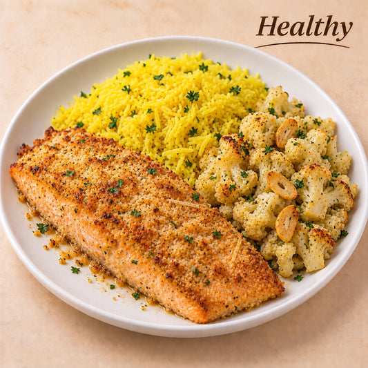 AVAILABLE NOW, FROZEN- Dijon mustard salmon with panko and Parmesan crust, saffron basmati rice and cauliflower with sliced garlic.
