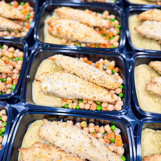 HEALTHY 500G- Oven-baked panko-crusted tilapia, mashed plantains, and chickpea salad with carrots and peas.